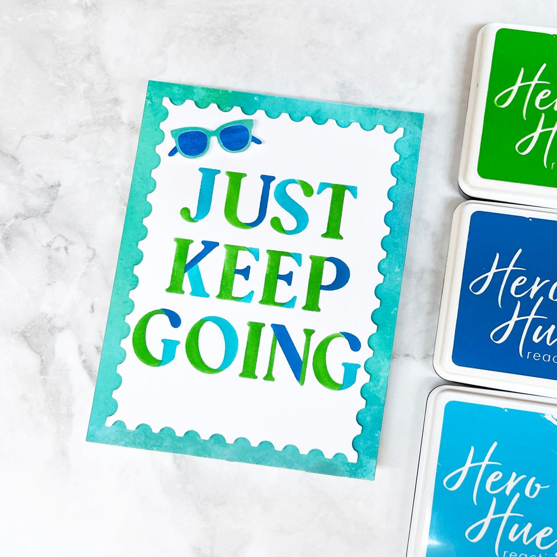 A bold encouraging card that says "Just Keep Going".
